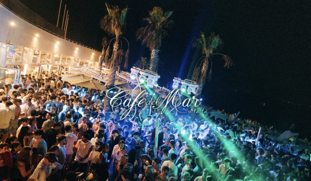 Cafe Del Mar Malta crowd view with dancing and club lights