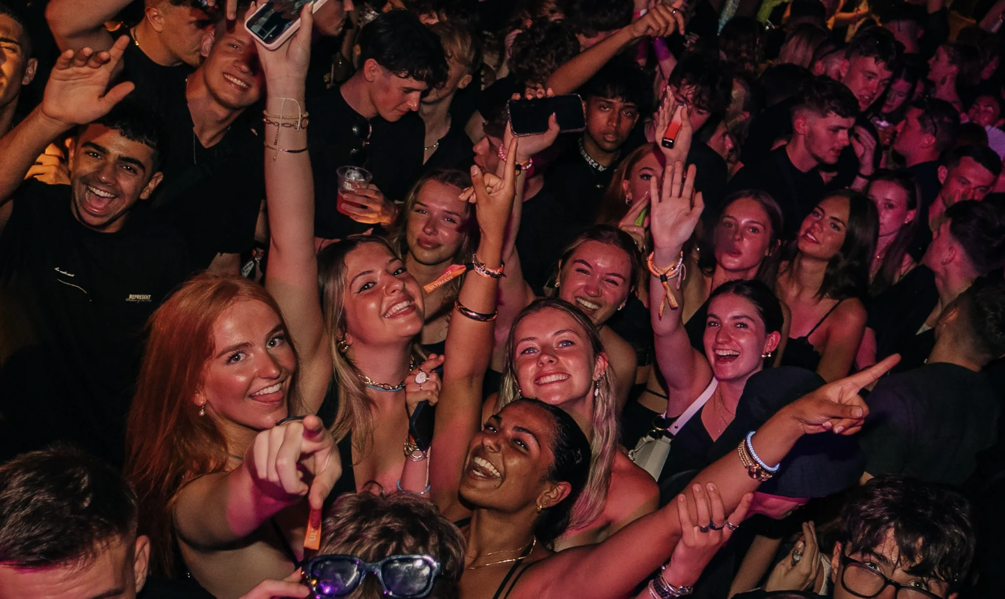 Crowd going off at Agenda Club Malia, packed dancefloor, hands in the air, and non-stop summer party vibes all night.