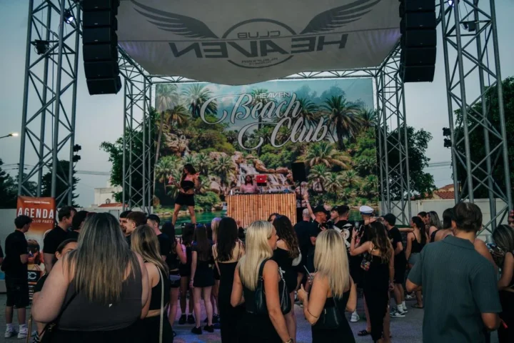 Crowd gathering as the DJ kicks off the night at Agenda Beach Club Party, ready for non-stop summer tunes.