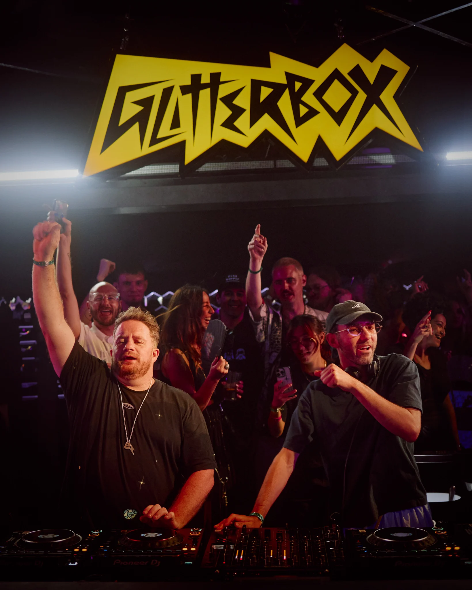 DJs performing at Glitterbox in Ibiza with the crowd going wild, pure house beats and electric party energy.